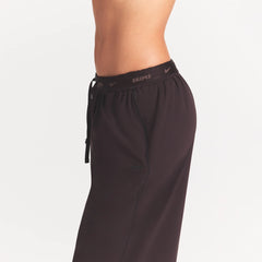 NikeSKIMS STRETCH NYLON OVERSIZED PANT | DARK ROAST