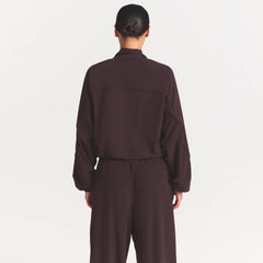 NikeSKIMS STRETCH NYLON OVERSIZED TRACK JACKET | DARK ROAST