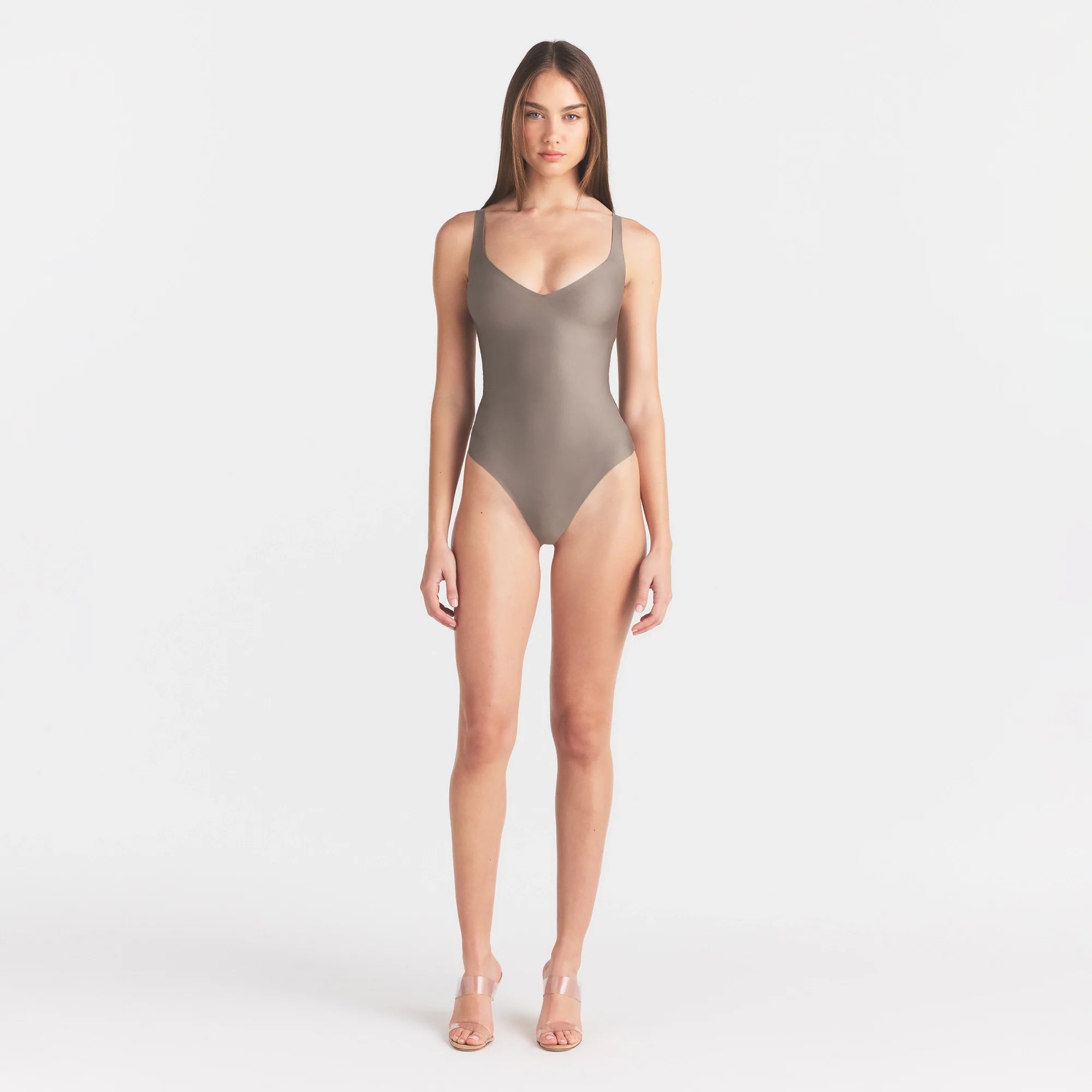 SKIMS BODY UNLINED PLUNGE THONG BODYSUIT | MINK