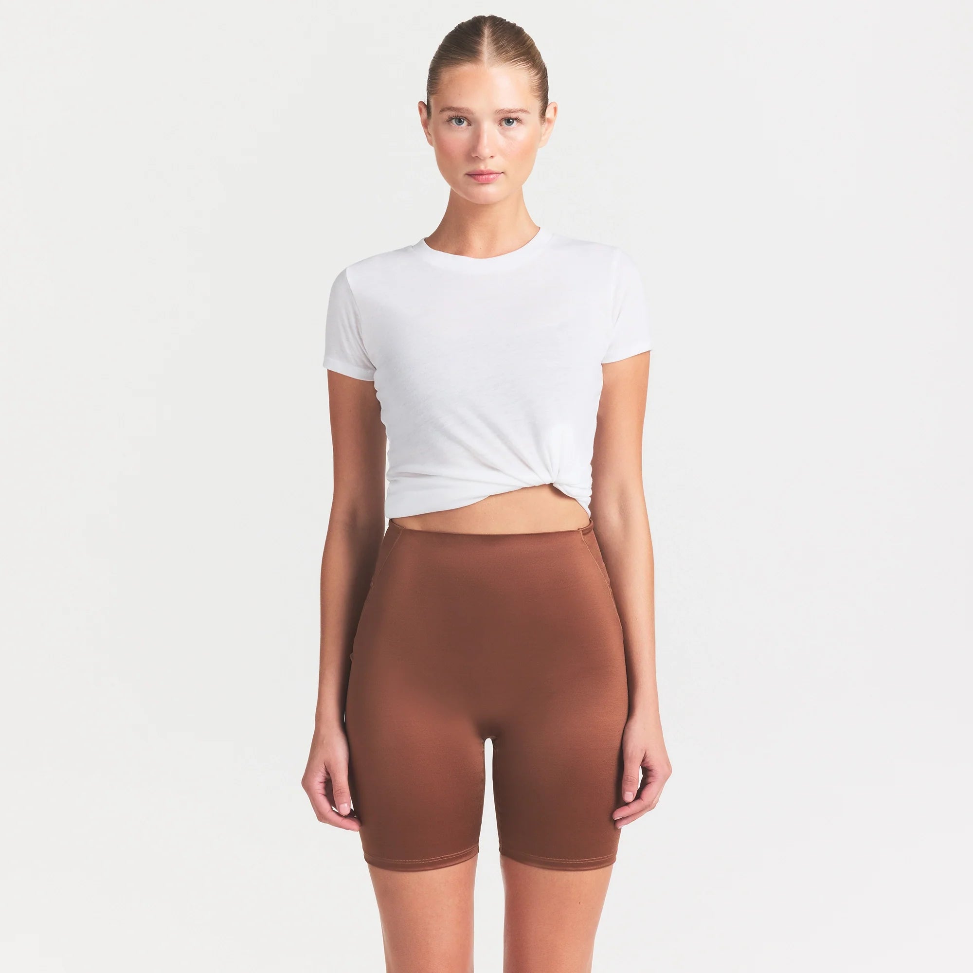 NikeSKIMS SATIN SHINE BONDED WAIST 7" BIKER SHORT | CAROB BROWN