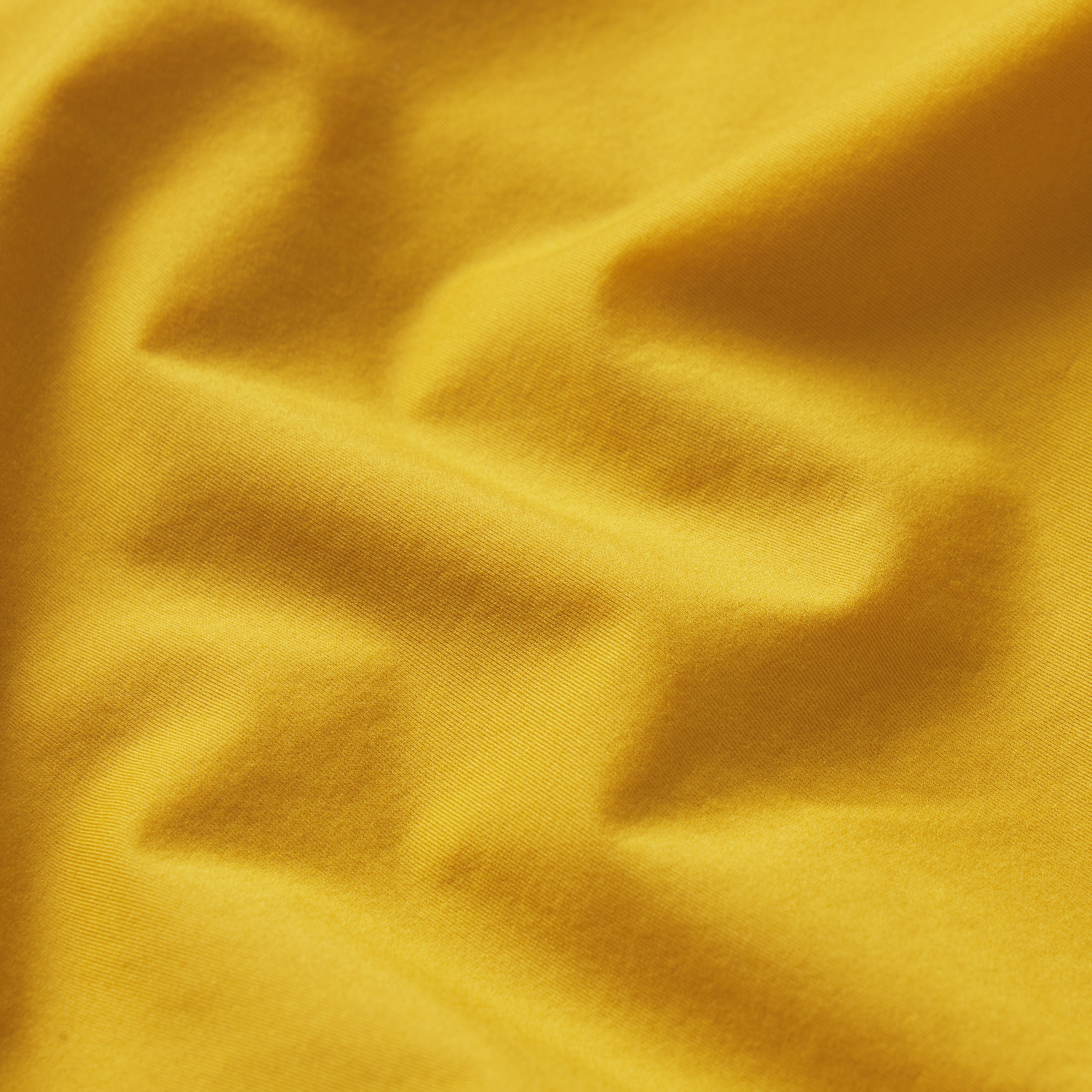 NikeSKIMS WEIGHTLESS LAYERS MOCK NECK SHORT SLEEVE T-SHIRT | CITRINE