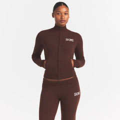 SWEATER KNIT LOGO ZIP UP MOCK NECK SWEATER | COCOA EGRET
